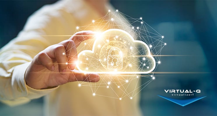 man in yellow shirt holds hand up behind glowing graphic of padlock and cloud