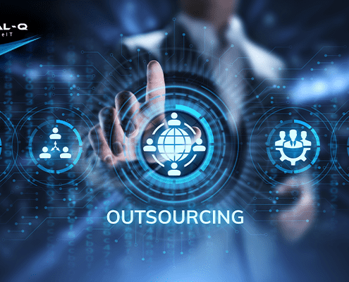 circular IT graphics above the word "outsourcing" over dark background with man in suit