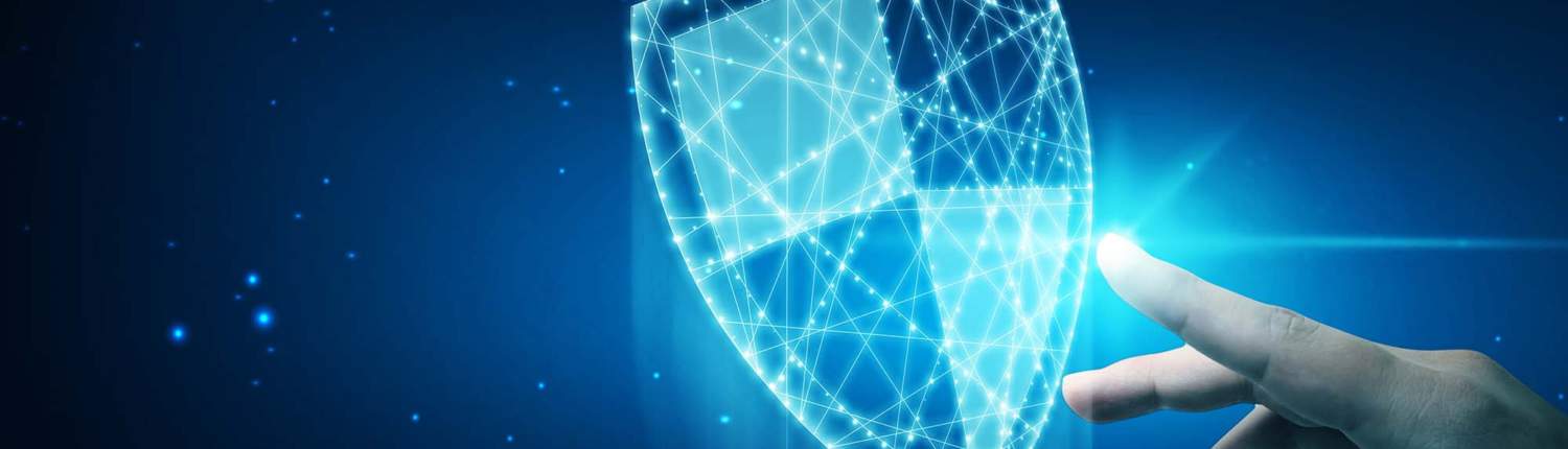 cybersecurity concept person touches a shield